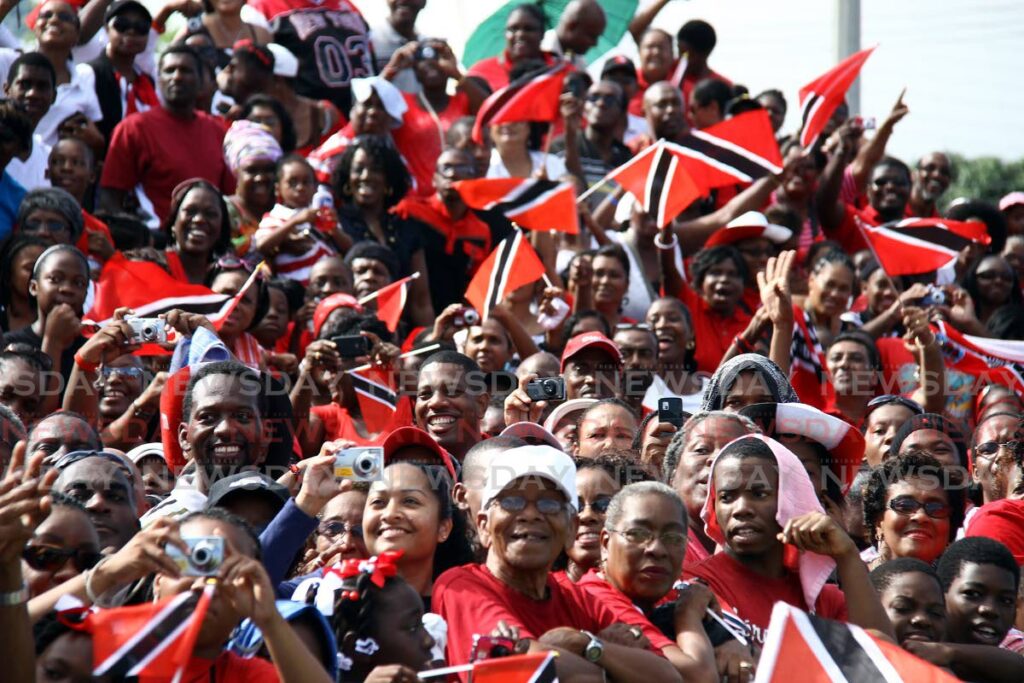 Spectators hold up digital cameras to capture a 'piece of the action' as they watched the 50th anniversary of Independence parade on August 31, 2012 at the Queen's Park Savannah, Port of Spain.
File photo/Sureash Cholai