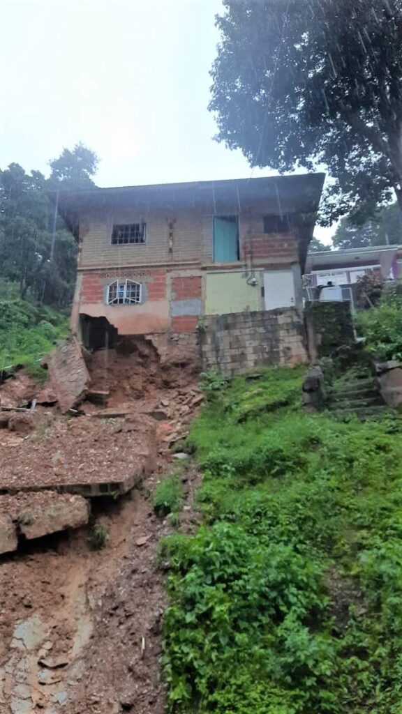 The home of Simone Mundy at L'Anse Mitan Road, Carenage, after a landslide took part of the downstairs after heavy rains on Monday. - Joshua Labadie