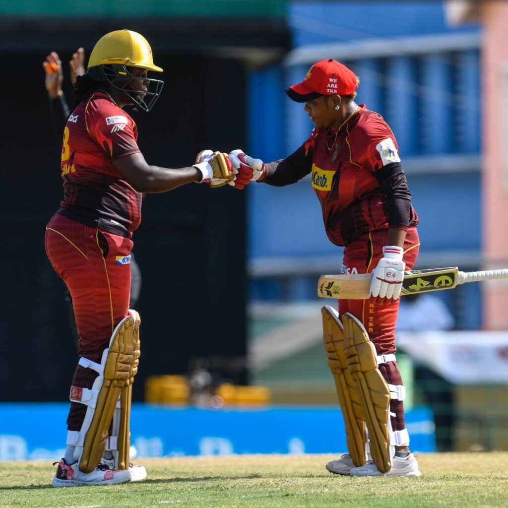 Lee-Ann Kirby (left) and Natasha McLean punch fists during the Trinbago Knight Riders' match against the Barbados Royals in their Massy Women's Caribbean Premier League (WCPL), at Warner Park, Basseterre, St Kitts on Wednesday. PHOTO COURTESY TRINBAGO KNIGHT RIDERS. - 