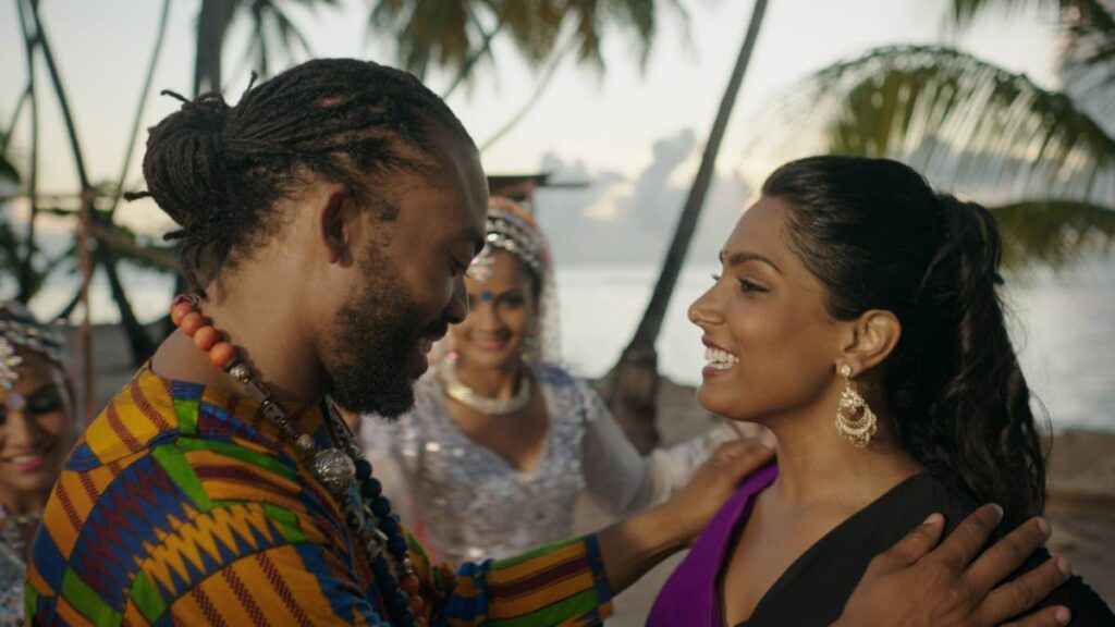 Machel Montano, left, and Natalie Perera in a scene from the film Bazodee. - 