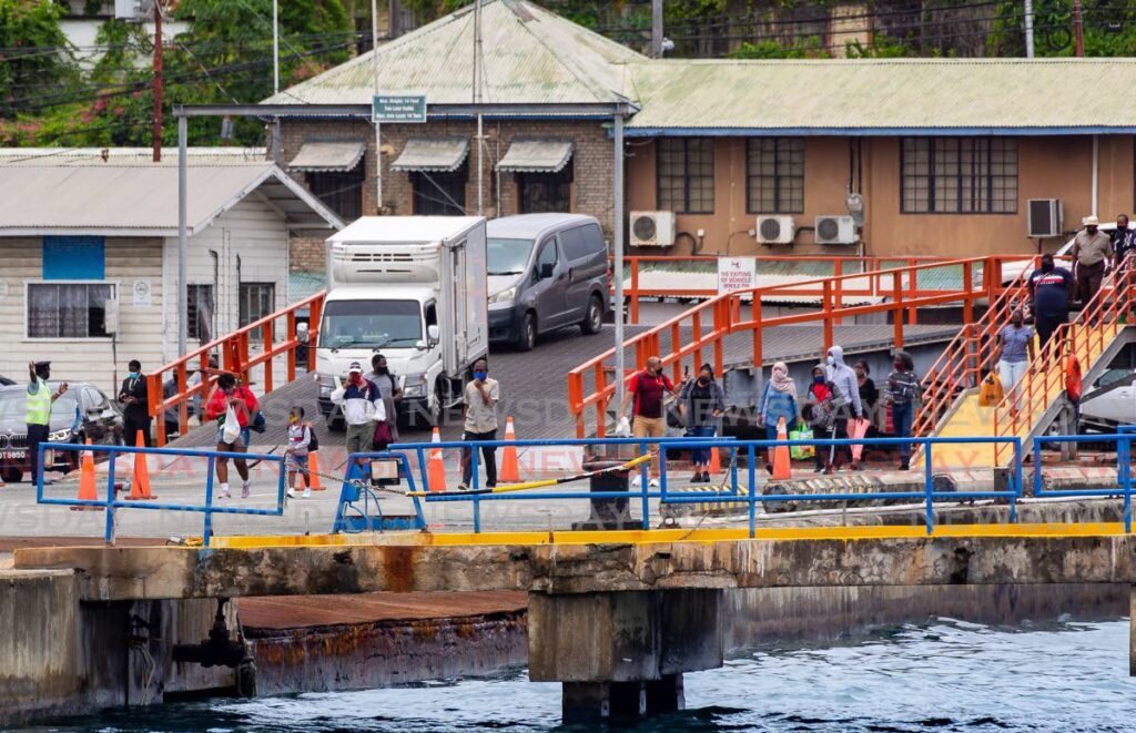 Passengers leave Buccoo Reef ferry after its maiden commercial voyage to the Port of Scarborough from Port of Spain in June 2021. File photo/David Reid