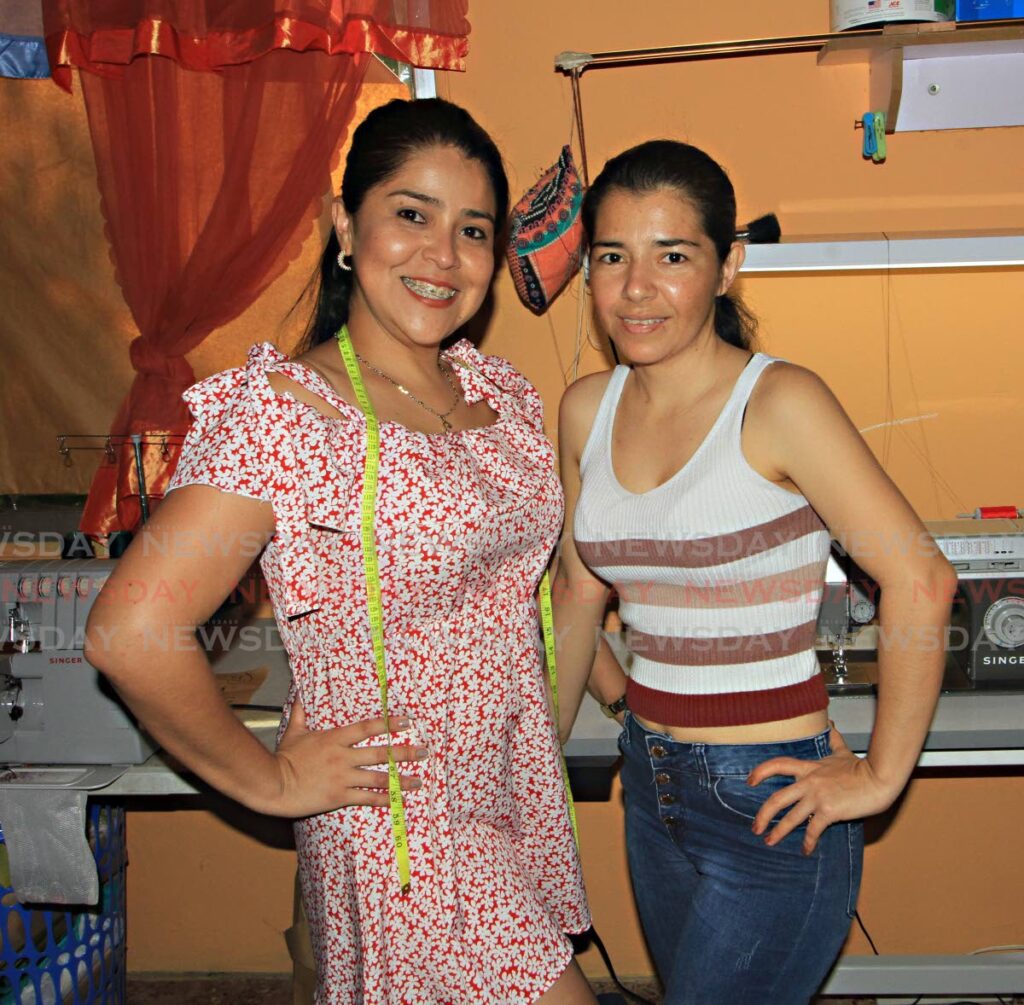 Ingrid Diaz, left, and Yennifer Muñoz Ramirez are professionals who studied in Venezuela and have made a long journey through women’s fashion there. Photo by Angelo Marcelle