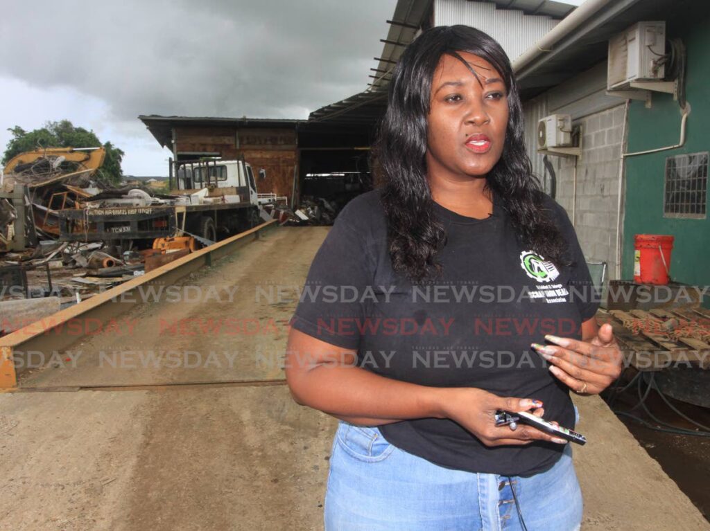 Willetta Wilson, at the Scrap Iron Dealers Association in Kelly Village, Caroni, first started as an administrative volunteer. She is now the association's secretary.  - ANGELO MARCELLE
