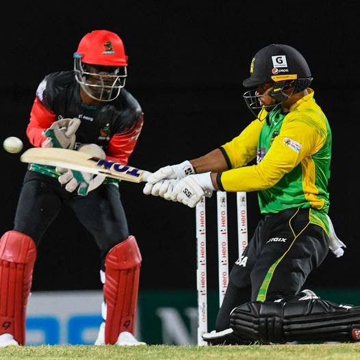 Jamaica Tallawahs opening batsman Brandon King (right) executes a reverse sweep shot during his innings of 89 against the St Kitts/Nevis Patriots, in their 2022 Hero Caribbean Premier League (CPL) match at Warner Park, Basseterre, St Kitts on August 31, 2022. PHOTO COURTESY HERO CPL. - 