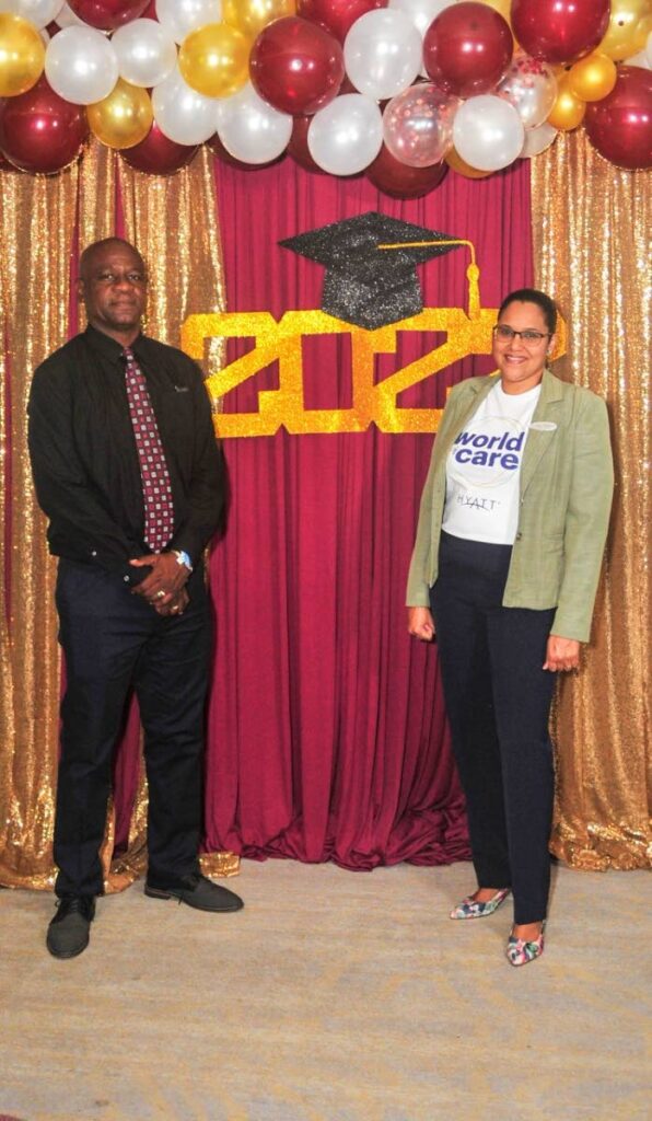  Derrick Phillip, Principal, East Mucurapo Secondary School with Tracy Awai, Director of Human Resources at Hyatt Regency Trinidad, at the graduation dinner and dance. - 