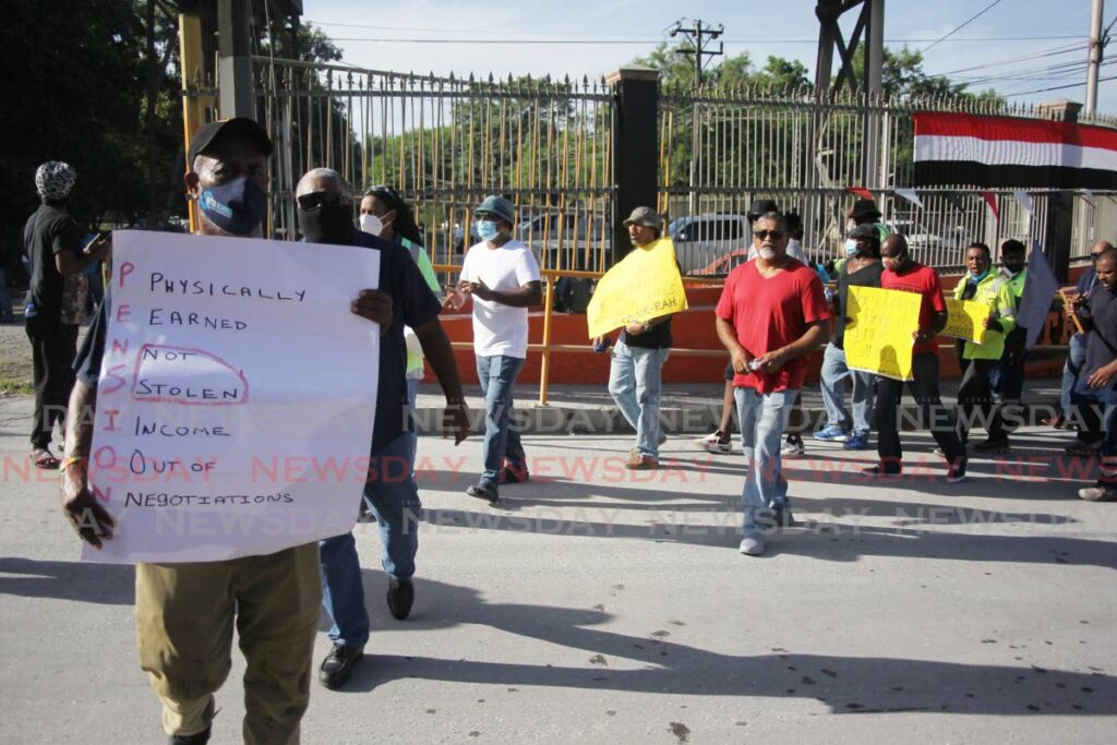 In this 2022 file photo, Trinidad Cement limited workers and members of the OWTU including President General Ancel Roget staged an early morning protest outside the Claxton Bay plant of TCL.