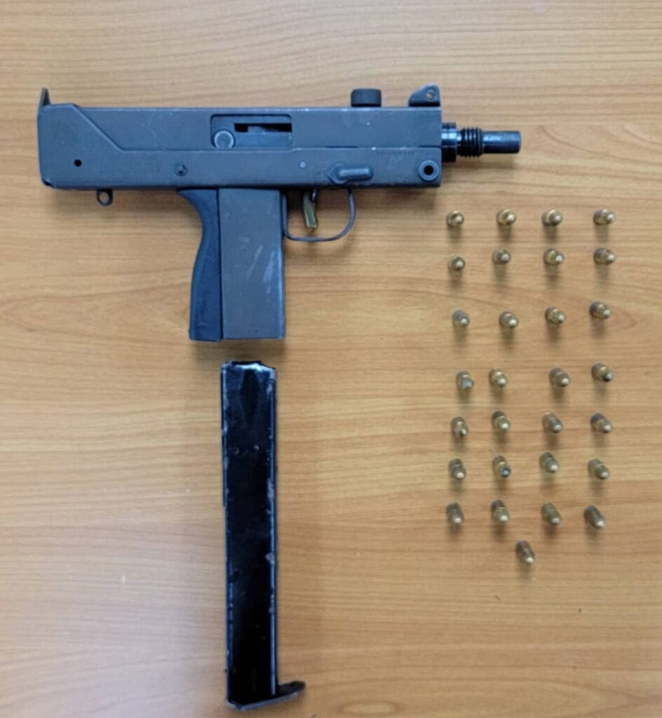 Gun and ammo seized by police last month in this photo courtesy the TTPS - 