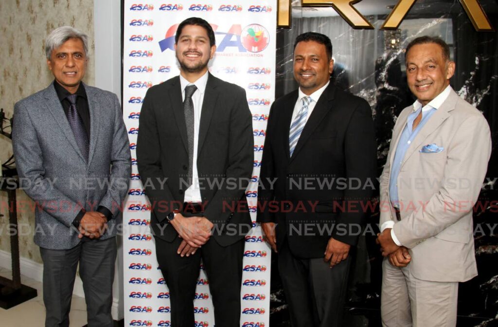 From left, executive director of the Caribbean Supermarket Association Curtis Mohammed, chairman Rajiv Diptee, co-founder Vernon Persad, and vice chairman Vasant Bharath pose for a photo during the formal inauguration of Caribbean Supermarket Association (CSA) at Krave Restaurant, Tarouba Link Road, Marabella.  Photo by Ayanna Kinsale