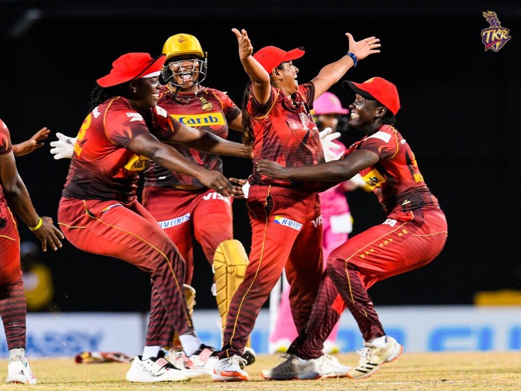 Trinbago Knight Riders surround teammate Anisa Mohammed after she took the final wicket against Barbados Royals to win the Women's CPL final in Warner Park, St Kitts.  Photo courtesy Trinbago Knight Riders