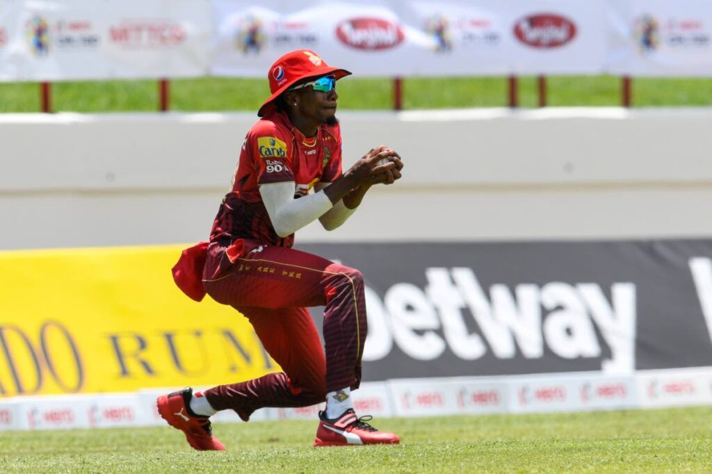 Trinbago Knight Riders' Khary Pierre takes a catch at deep midwicket to dismiss Barbados Royals' captain David Miller during the teams' match in the Hero Caribbean Premier League, at the Darren Sammy Stadium, Gros Islet, St Lucia on Wednesday. PHOTO COURTESY CARIBBEAN PREMIER LEAGUE. - 