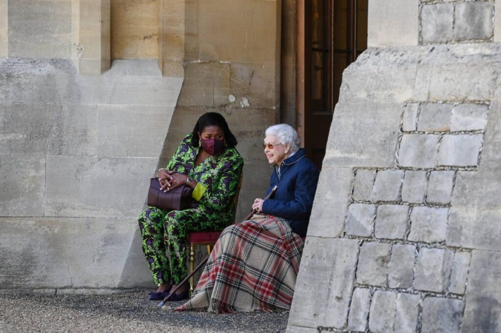 President Paula-Mae Weekes shares a light moment with Queen Elizabeth II before the Royal Windsor Horse Show during the President's visit to the UK in May. PHOTO COURTESY THE OFFICE OF THE PRESIDENT - 