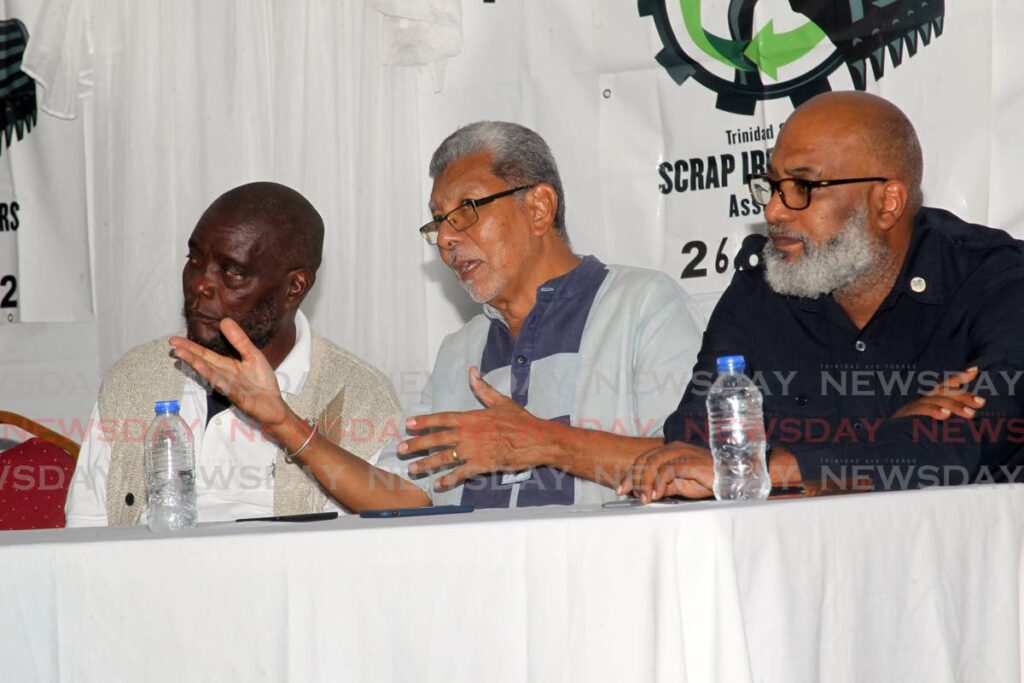 Scrap Iron Dealers Association president Allan Ferguson, from left, MSJ political leader David Abdulah and OWTU chief education and research officer Ozzi Warwick at the association's public meeting at Seafoods supermarket car park, Claxton Bay on Friday. - LINCOLN HOLDER