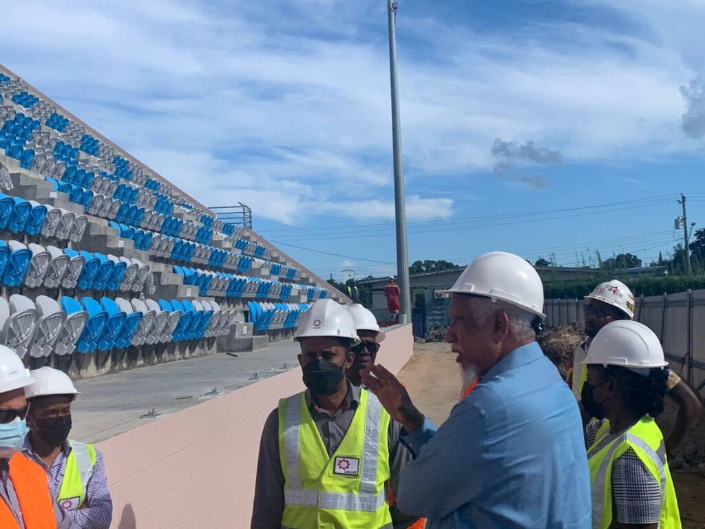 Udecott chairman Noel Garcia tours the new Mahaica Oval, Point Fortin, along with other workers. Photo via Point Fortin MP Kennedy Richards Jr''s Facebook page.  - 