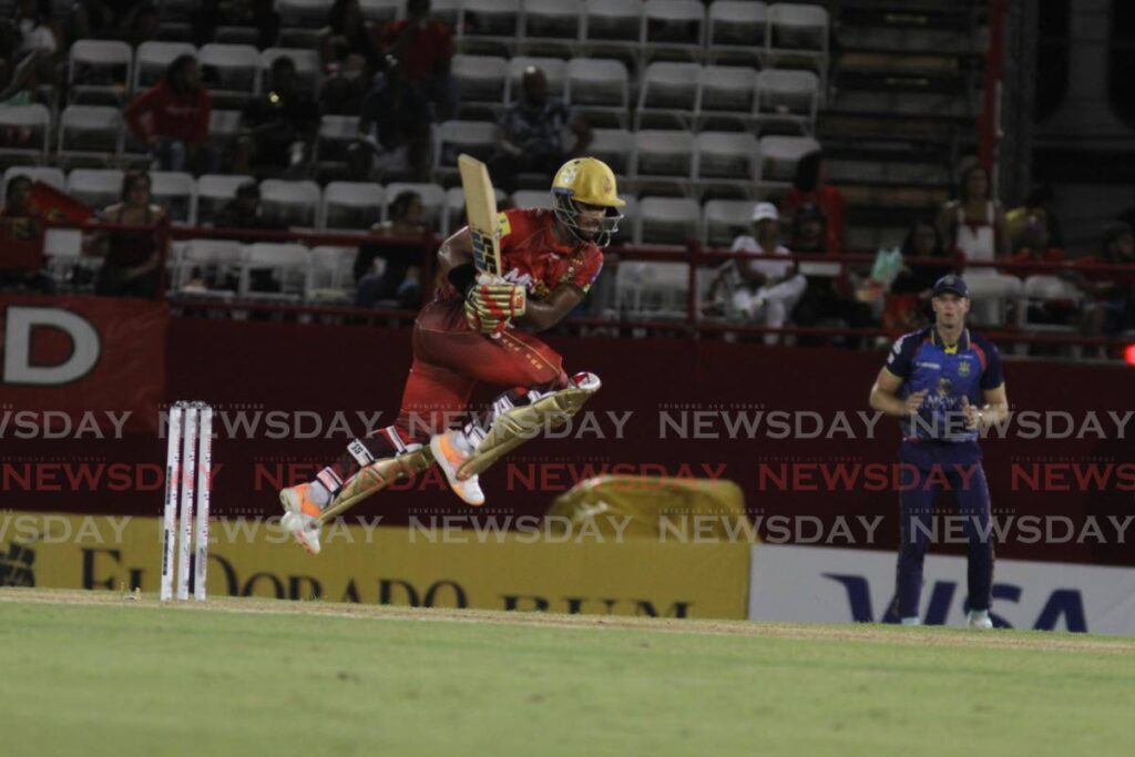 Nicholas Pooran goes airborne as he plays a pull shot during in a Hero Caribbean Premier League (CPL) match at the Queen's Park Oval. - Ayanna Kinsale