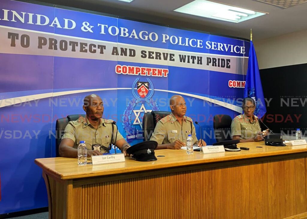 (From left) Supt Ian Carthy, Snr Supt Richard Smith and Insp Michelle Lewis at the Police Administration Building, Port of Spain, on Thursday morning.  Photo by Narissa Fraser