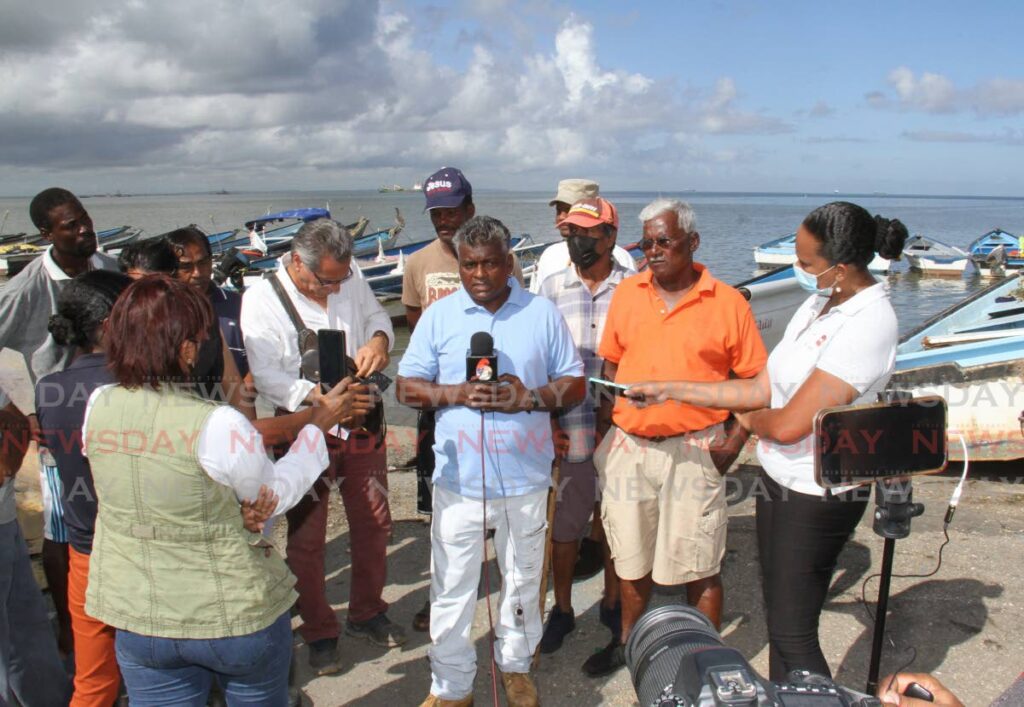 Claxton Bay Fishing Association president Nicholson Seecharan speaks with media on Friday at the Claxton Bay fishing facility about the death of fisherman Lennox Joefield whose body was found at sea on Thursday evening. - Marvin Hamilton
