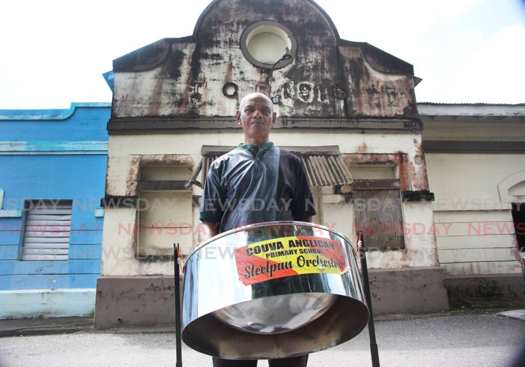 David Sylvester, co-founder of the NGC Couva Joylanders steelband, stands in front of the old train station on Railway Road, Couva. The area is the proposed site for the Railway Strip Heritage Park. - LINCOLN HOLDER