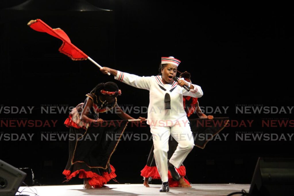 Michelle A Henry performs We Still Here at the Diamond Jubilee Independence Calypso Monarch Semi-Finals at Naparima Bowl in San Fernando on Saturday night. - Marvin Hamilton