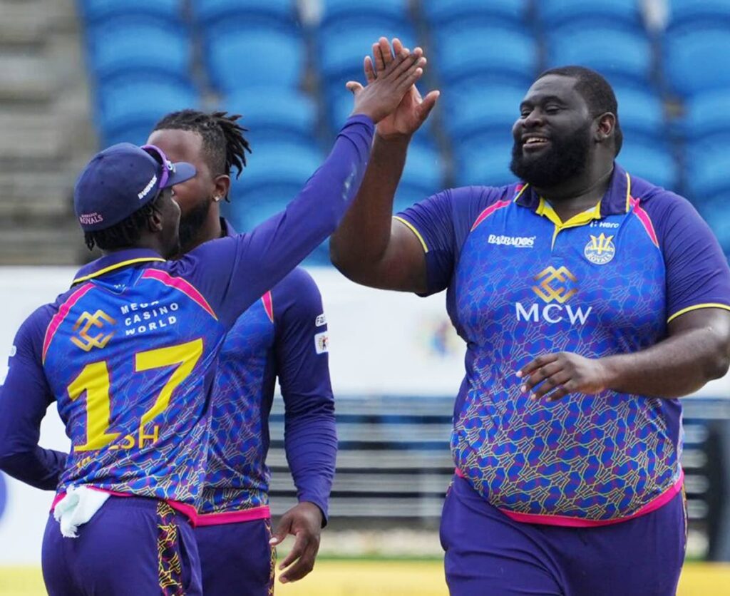 Barbados Royals spinner Rahkeem Cornwall, right, celebrates a wicket against Guyana Amazon Warriors in the Hero Caribbean Premier League at the Brian Lara Cricket Academy on Sunday.  - Barbados Royals 