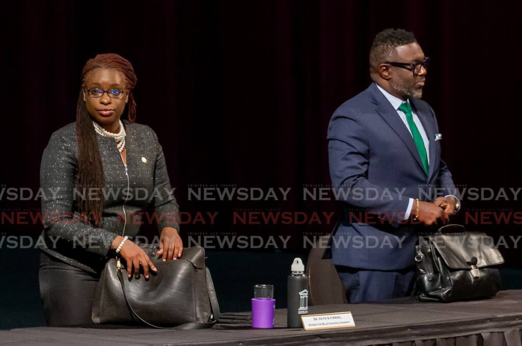 Newly elected THA Deputy Chief Secretary Dr Faith BYisrael, left, and her predecessor Watson Duke at a special sitting of the assembly, Shaw Park Cultural Complex, Monday. - David Reid