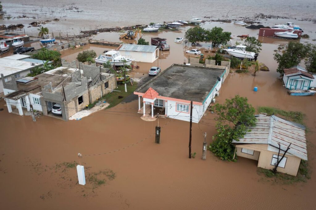 Homes are flooded on Salinas Beach after the passing of Hurricane Fiona in Salinas, Puerto Rico. AP PHOTO - 