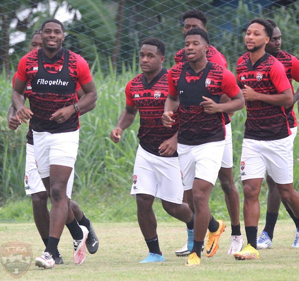 Members of the TT men’s football team during a training session at Nice Place Sporting Club training facility in Thailand on Tuesday. PHOTO COURTESY TTFA - 