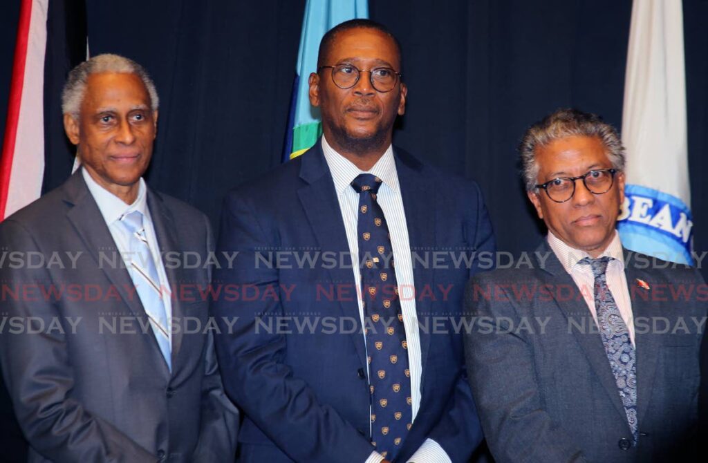 Justice Adrian Saunders President of the  the Caribbean Court of Justice from left , Chief Justice Ivor Archie and  Attorney General Reginald Armour, SC at the   Hemispheric Meeting of Regional Courts at the Hyatt Regency in Port of Spain. - Photo by Sureash Cholai 