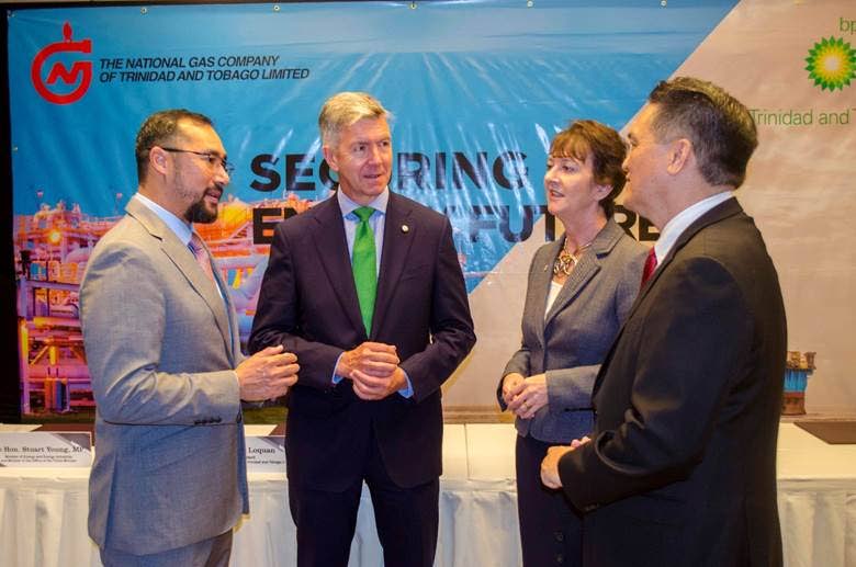  Energy Minister Stuart Young, from left, David Campbell, incoming bpTT president, Claire Fitzpatrick, outgoing bpTT and NGC president Mark Loquan chat after the signing of a new gas supply contract between the companies at Hyatt Regency, Port of Spain on Friday. Photo courtesy NGC - 