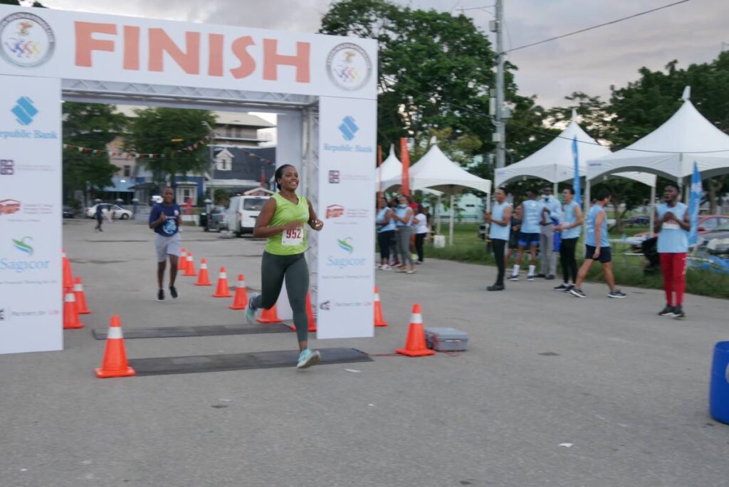 Adona Francois, representing Sagicor, was the first female finisher, in the CariFin Games One-Lap Savannah race. - 