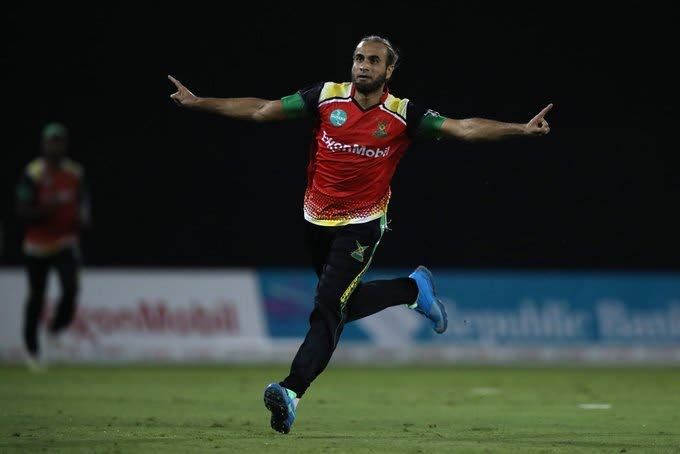 Guyana Amazon Warriors leg-spinner Imran Tahir celebrates after taking the wicket of Colin Munro, of the Trinbago Knight Riders, during the teams' Hero Caribbean Premier League (CPL) match, at the Providence Stadium in Guyana, on Saturday. PHOTO COURTESY CARIBBEAN PREMIER LEAGUE. - 