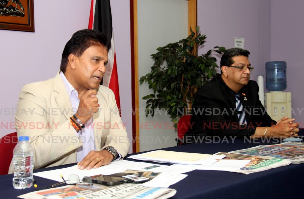 WARNING: Oropouche East MP Dr Roodal Moonilal makes a point at the UNC's weekly Sunday press conference in Port of Spain. At right is Mayaro MP Rushton Paray. PHOTO BY AYANNA KINSALE - 