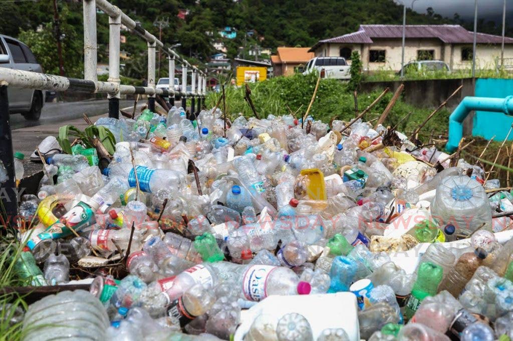 A pile of plastic bottles near the Diego Martin river after flooding in December 2019. File photo/Jeff Mayers - 