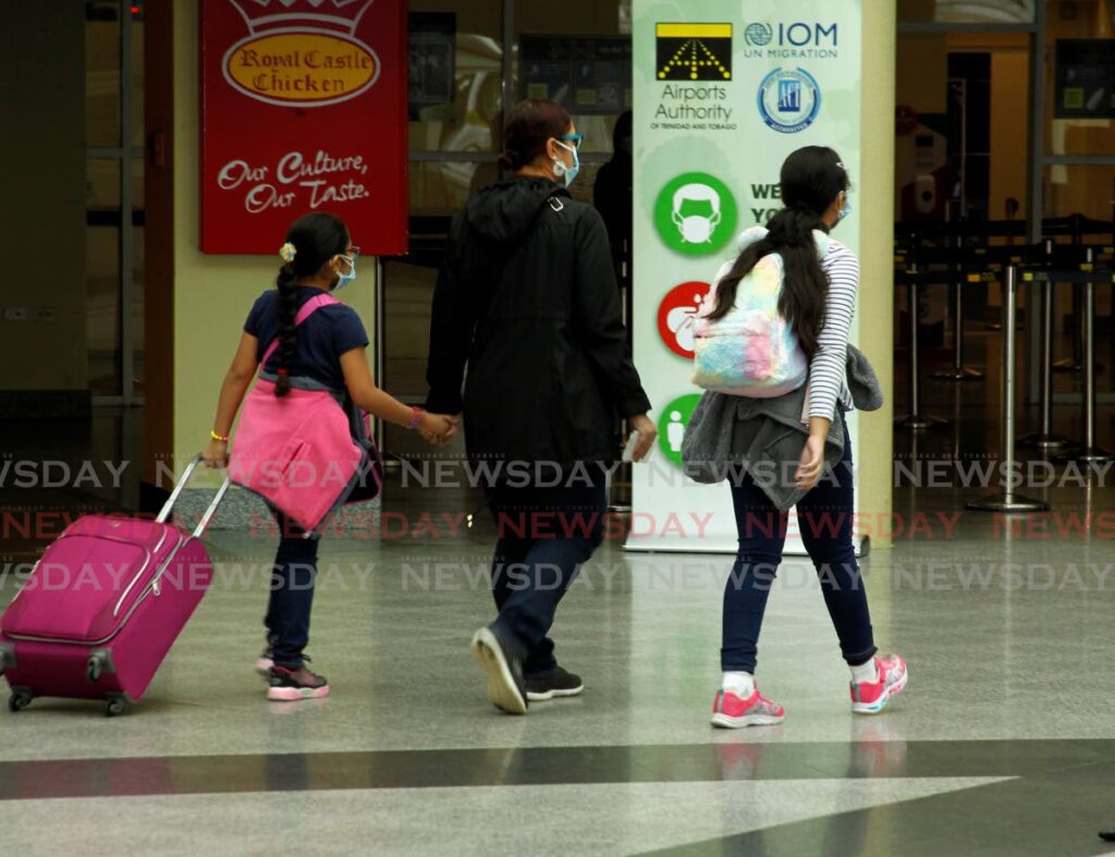 Travellers had to the atrium of Piarco International Airport in July 2021. - File Photo by Roger Jacob