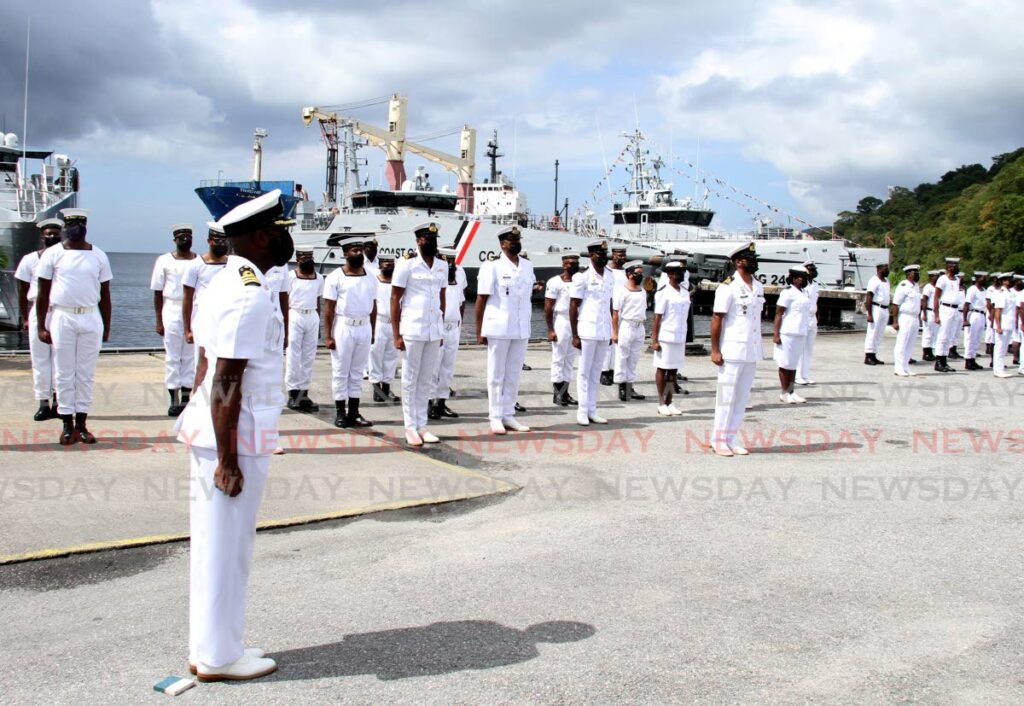 In this file photo, Coast Guard officers during a parade at the formal launch of the two Cape Class vessels, in background, at Staubles Bay, Chaguaramas in 2021. - Ayanna Kinsale