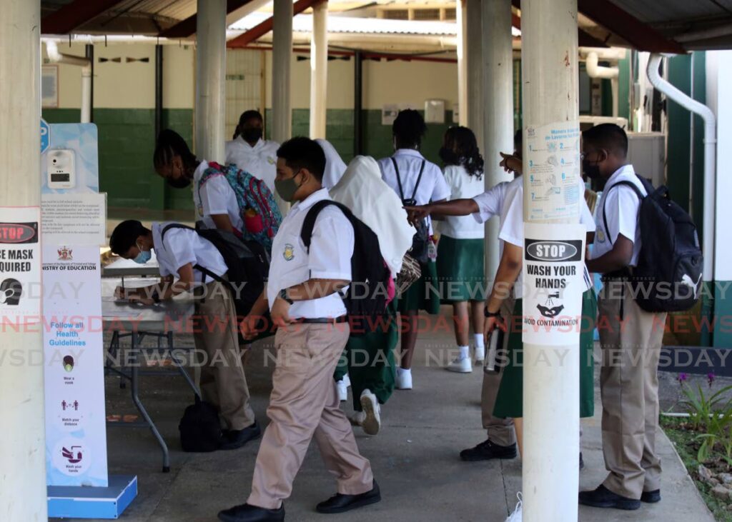 Forms one to three students join other forms at St George's College, Barataria on February 7. Classes will relocate to UTT, Valsayn on Monday as the college undergoes renovation. - File Photo by Sureash Cholai
