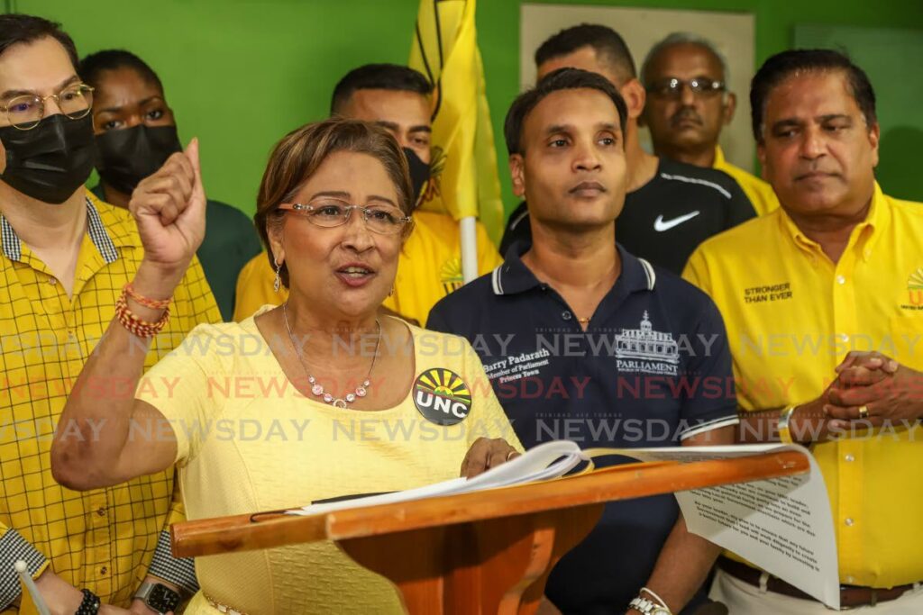 UNC political leader Kamla Persad-Bissessar addresses party members at her constituency office after her slate won the internal elections on June 26. File photo/Jeff K Mayers