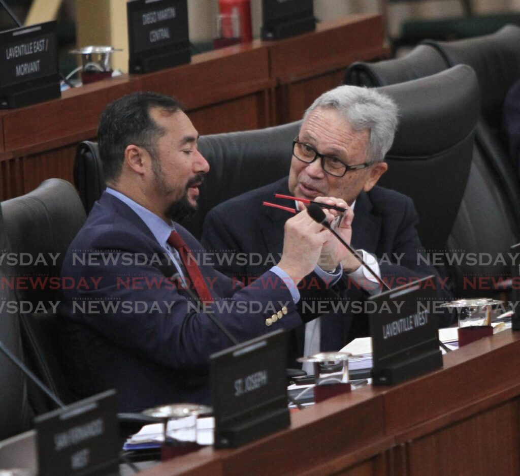 Energy Minsiter Stuart Young, left, and Finance Minister Colm Imbert during the budget debate in Parliament on Friday. - ANGELO MARCELLE