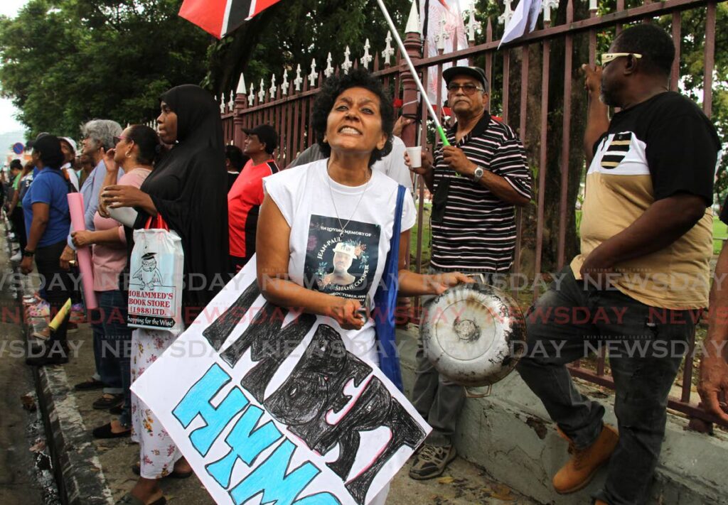Activist Nazma Muller during a protest against the budget at Woodford Square, opposite the Red House, Port of Spain on Friday. - AYANNA KINSALE