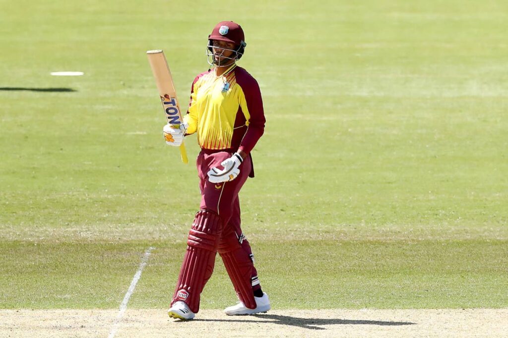 Brandon King of the West Indies raises his bat after reaching his half-century during the ICC T20 World Cup warm-up match between the WI and the United Arab Emirates at the Junction Oval, Melbourne, Australia on Monday. - Photo Courtesy Cricket West Indies