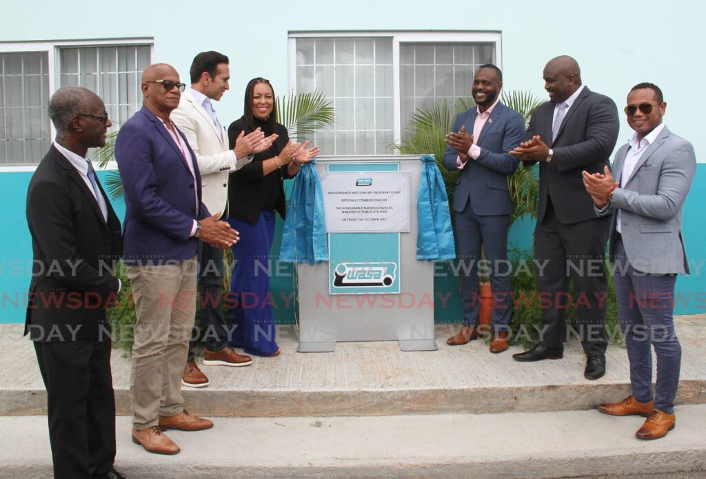 Public Utilities Minister Marvin Gonzales, third from right, and IDB country representative Carina Cockburn, fourth from left, are joined by San Fernando West MP Faris Al-Rawi, San Fernando Mayor Junia Regrello, San Fernando East MP Brian Manning and other officials at the commissioning of the San Fernando wastewater treatment plant on Friday. Photo by Marvin Hamilton