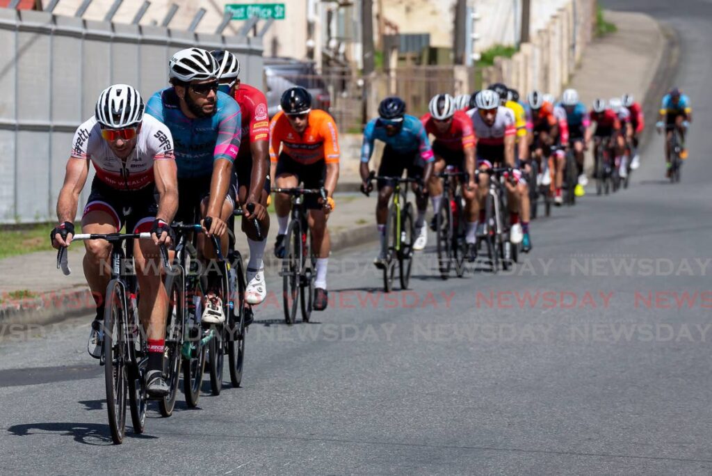 Division One cyclists started their 50-lap race, in stage two of the Tobago International Cycling Classic, on Wilson Road, Scarborough, Tobago on Saturday.  - David Reid