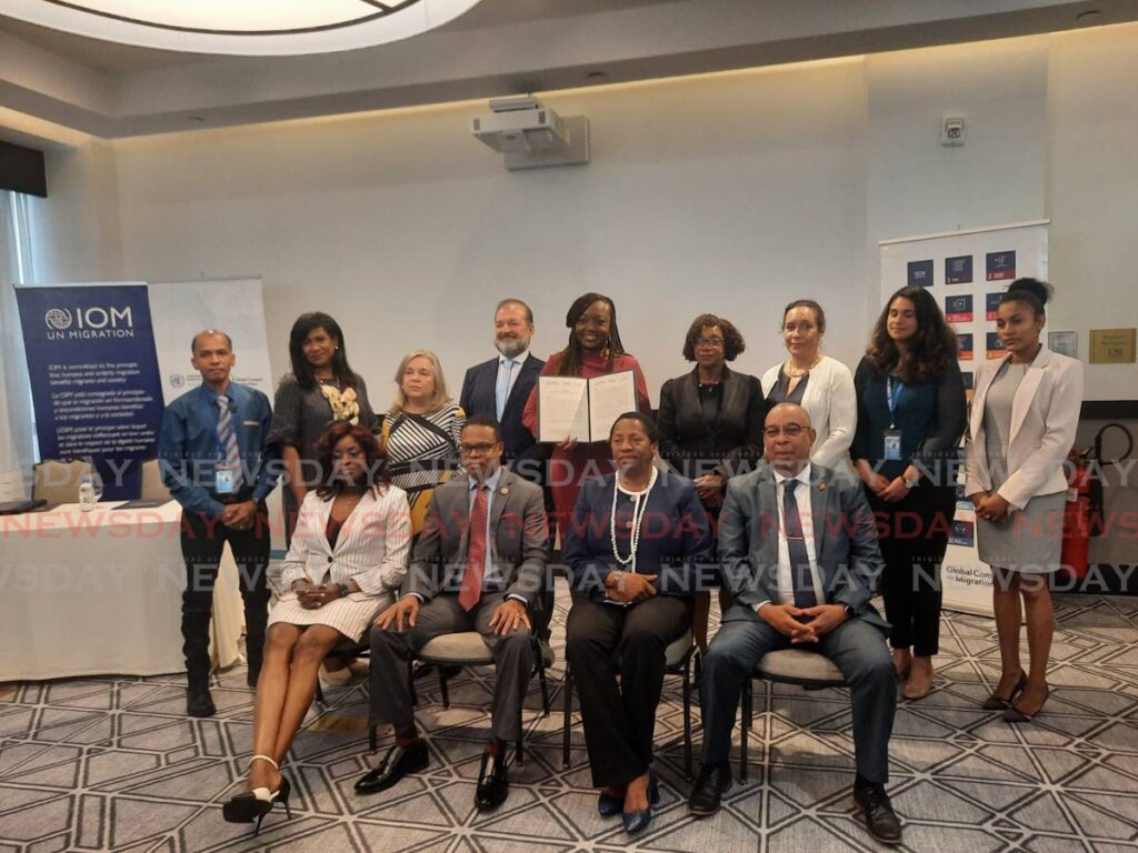 Attendees at the Launch of the United Nations Network on Migration – Trinidad and Tobago (UNNM-TT) held Monday at The Brix, Autograph Collection, Port of Spain.
(L-R back row) Sheldon Ramroop,  Alma Jenkins, Martha Cecilia Pinilla Perdomo, Gerardo Noto, Jewel Ali, Dr Erica Wheeler,  Aurora Noguera-Ramkissoon, Gina Maharaj and Karyce Phillips.

Also in the image are Minister of Social Development and Family Services Donna Cox, Minister of Foreign and CARICOM Affairs Dr Amery Browne, Minister of Planning and Development Pennelope Beckles-Robinson and Minister of Labour Stephen Mc Clashie.   Photo by Paula Lindo