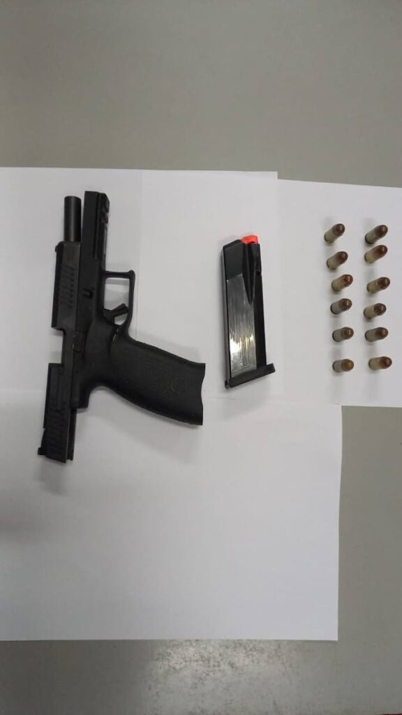 A pistol and 12 rounds of .45 calibre ammunition were found and seized by Port of Spain police on Tuesday morning. 

Photo courtesy TTPS