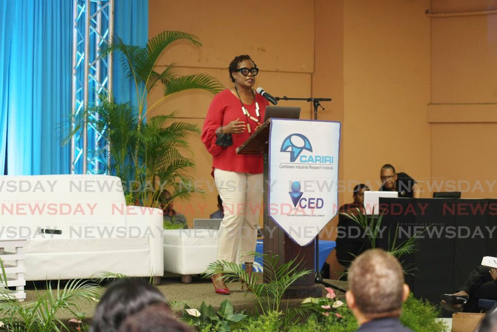 Katherine Bethel, general manager of B's ​​Homemade Ice Cream, speaks about supermarket requirements for small and medium-sized business owners at the CARIRI/Supermarket Association informational session at Center Pointe Mall, Chaguanas, Wednesday.  - Photo by Lincoln Holder