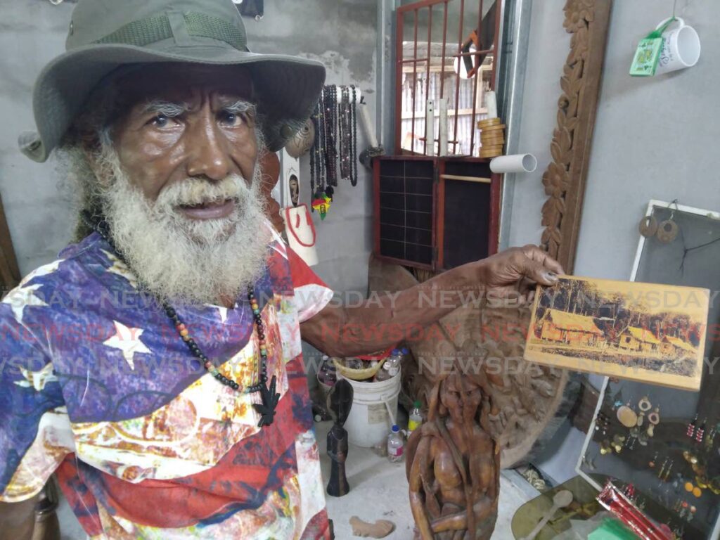 Reynold Wells at his Sangre Grande museum. Photo by Stephon Nicholas