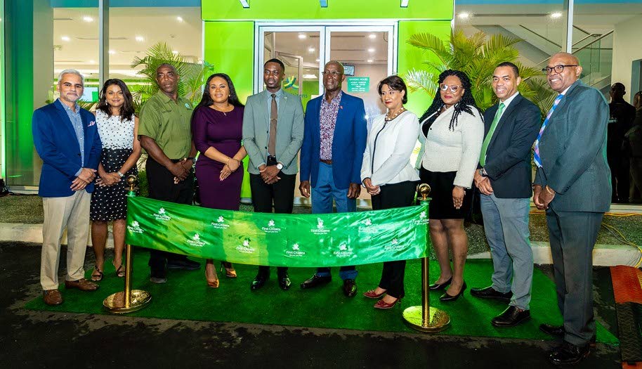 Prime Minister Dr Keith Rowley, fifth from right, Chief Secretary Farley Augustine, fifth from left, and First Citizens Group CEO Karen Darbasie, fourth from right, at the opening of the new First Citizens branch on Wednesday at Milford Road, Tobago. Also present are Tobago West MP Shamfa Cudjoe Lambeau/Lowlands assemblyman Wane Clarke, First Citizens Group Deputy CEOs Jason Julien and Professor Sterling Frost ORTT, Sana Ragbir- General Manager Retail and Commercial Banking and Kurt Headley - Head Retail Banking. - 