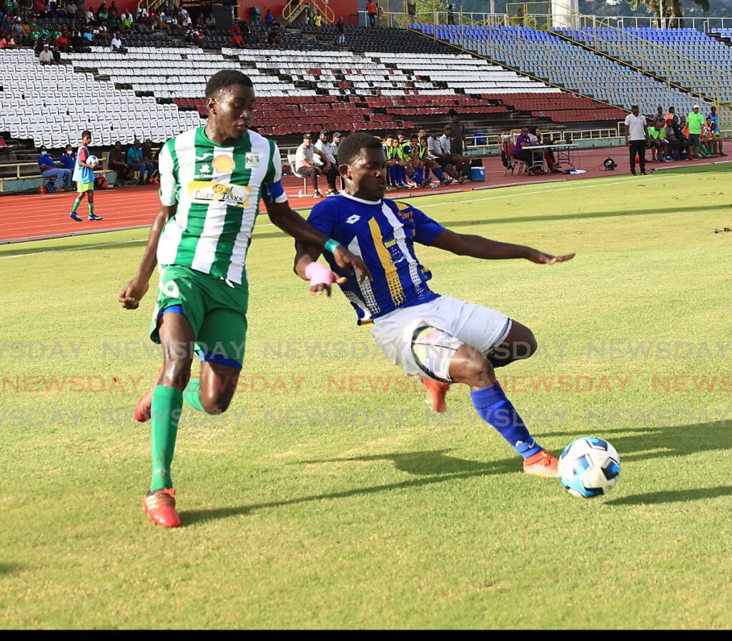 Fatima’s Jaden Williams (R) battles for possession of the ball against San Juan North Secondary’s Larry Noel, during the Secondary Schools Football League Premiership divison semi-final, on Saturday, at the Hasely Crawford Stadium, Port of Spain. - SUREASH CHOLAI