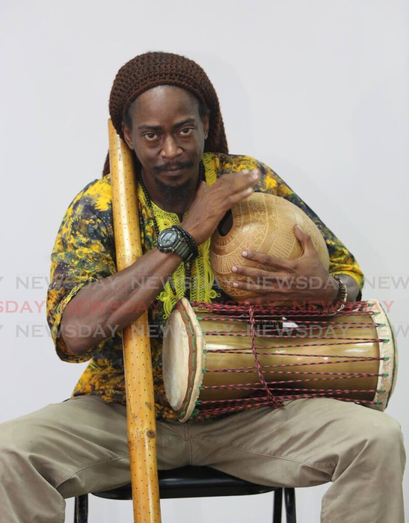 Baba Ayinde Onilu with organic instruments – a rain stick, bowlie drum and talking drum. Photo by Sureash Cholai