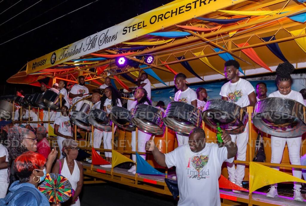 Spectators enjoy music from Massy Trinidad All Stars Steel Orchestra during the Pan Trinbago Pan and Powder event in Scarborough, on October 29. Photo by David Reid