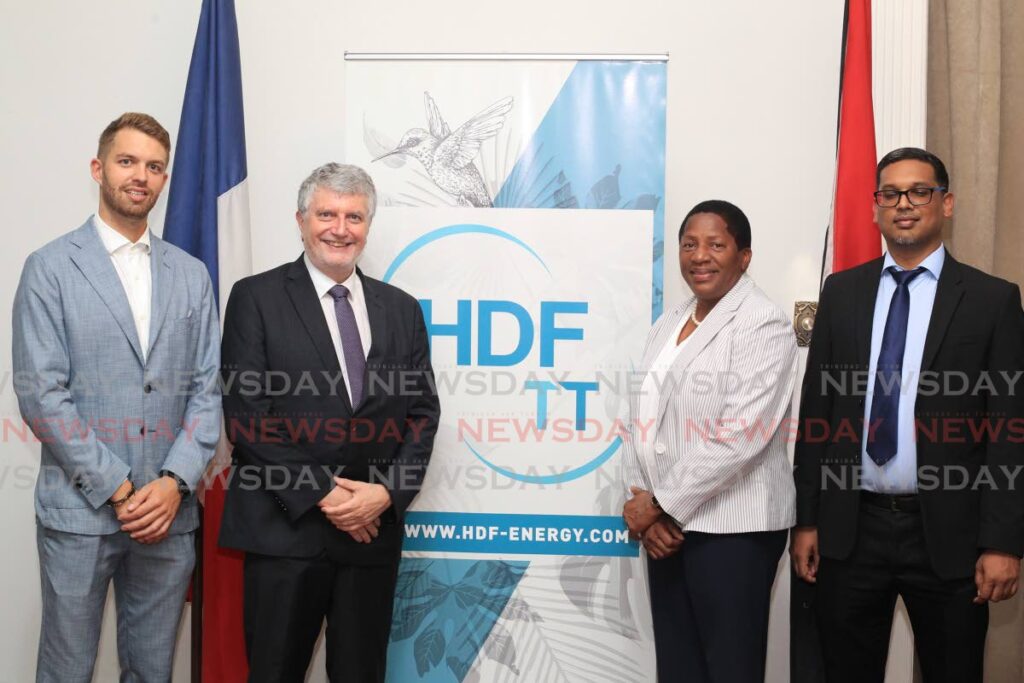 HDF executive vice president Thibault Ménage, from left, French Ambassador Didier, Planning and Development Minister Pennelope Beckles and HDF TT managing director Dale Ramlakhan at the launch of HDF's operation in TT at the French Embassy on November 4. - Photo by Roger Jacob